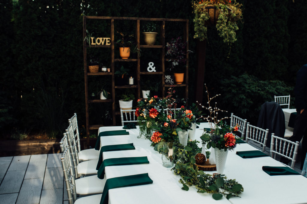 Reception dinner set up on patio of wauwatosa outdoor wedding venue Birch 