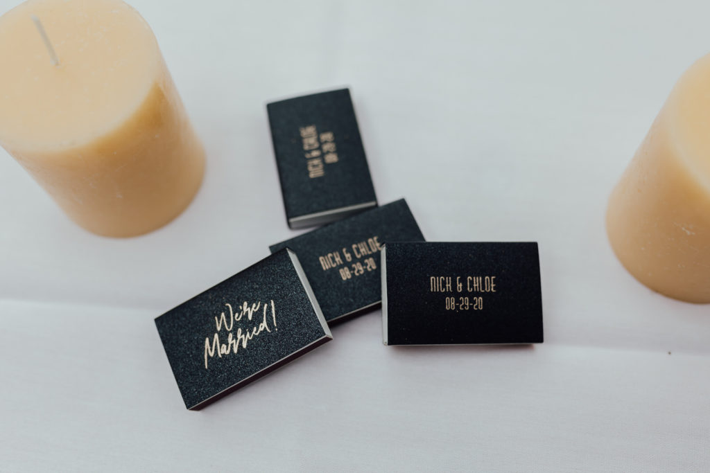 custom black matchbooks that say "just married" and couple's last name on them