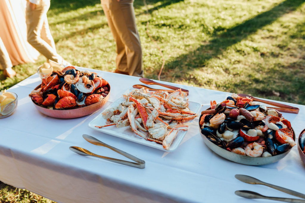 wisconsin intimate wedding seafood boil on white table cloth